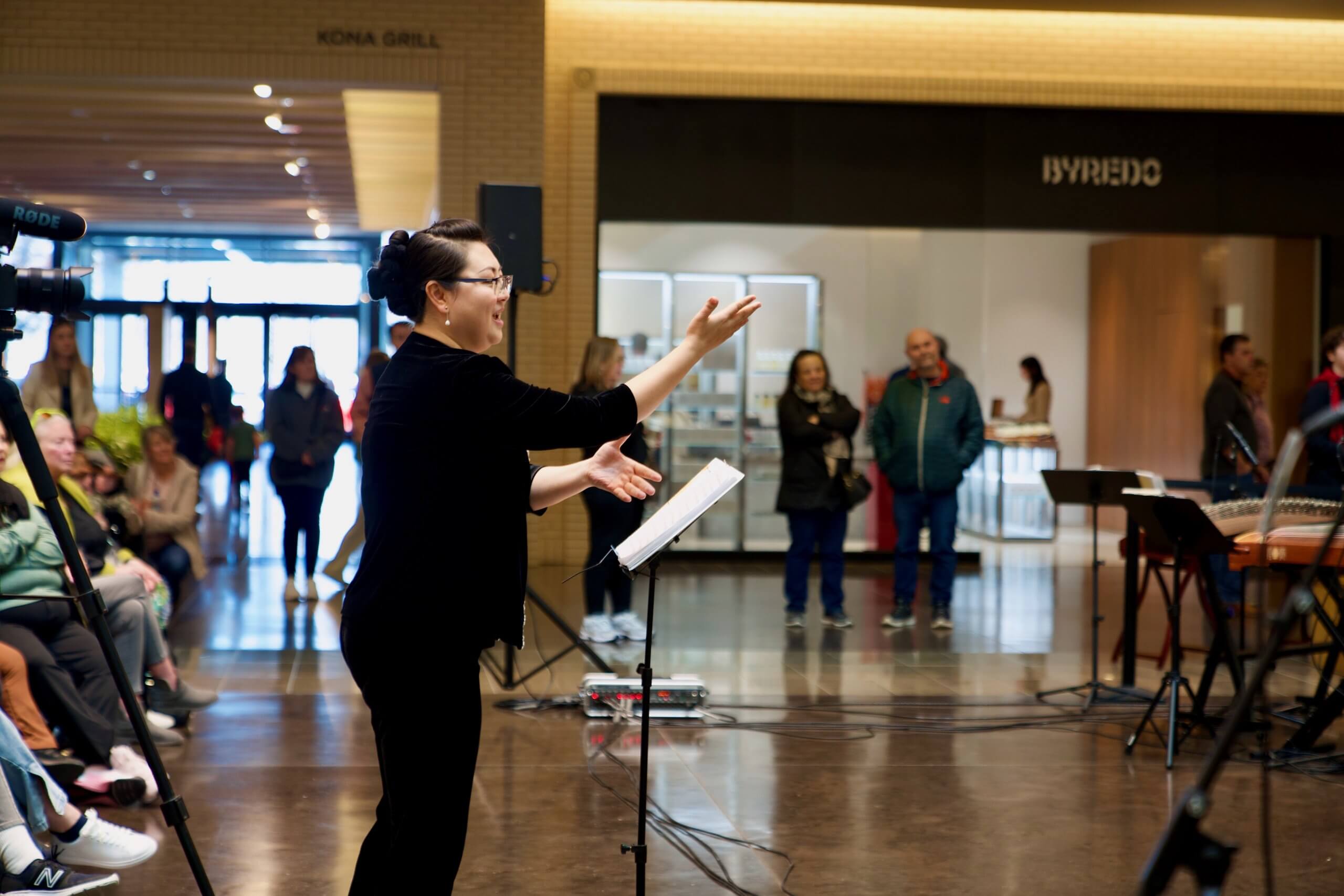 Dr. Yixuan Han performing on stage