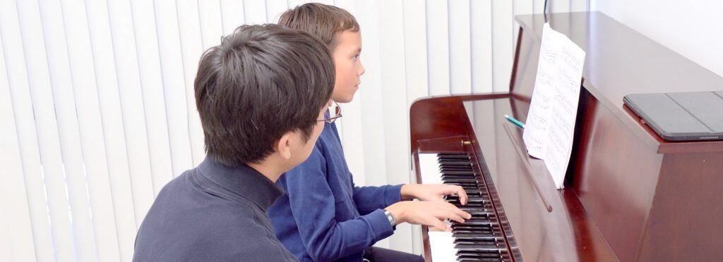 Students preparing for final vocal performance