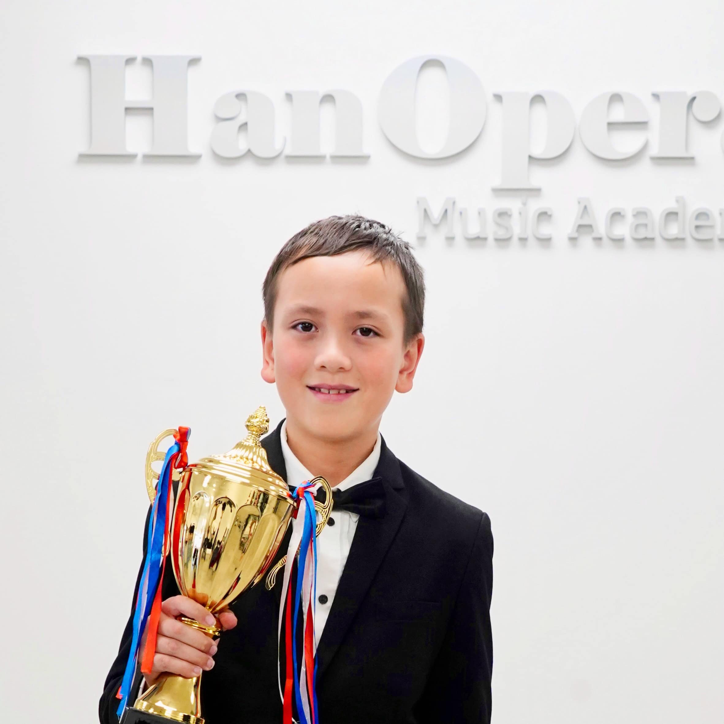 Alan C. singing competition award photo