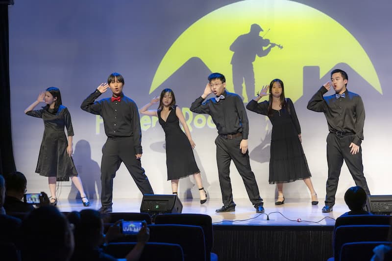 HanOpera student performers on stage during Singing for Love vocal concert in Plano, Texas