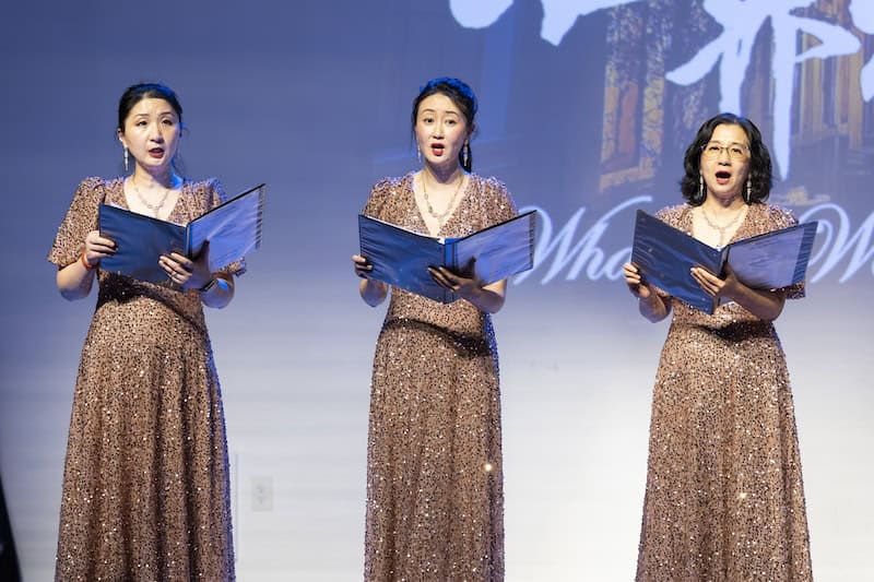 Student vocalist performing on stage at HanOpera Singing for Love concert highlights, Plano TX